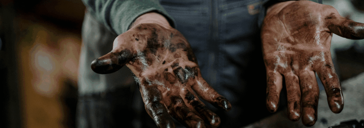 mechanic with dirty hands full of oil and grease - ADL Auto Repair & Driveshafts