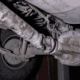 under of a vehicle focusing on the driveshaft - ADL Auto Repair & Driveshafts