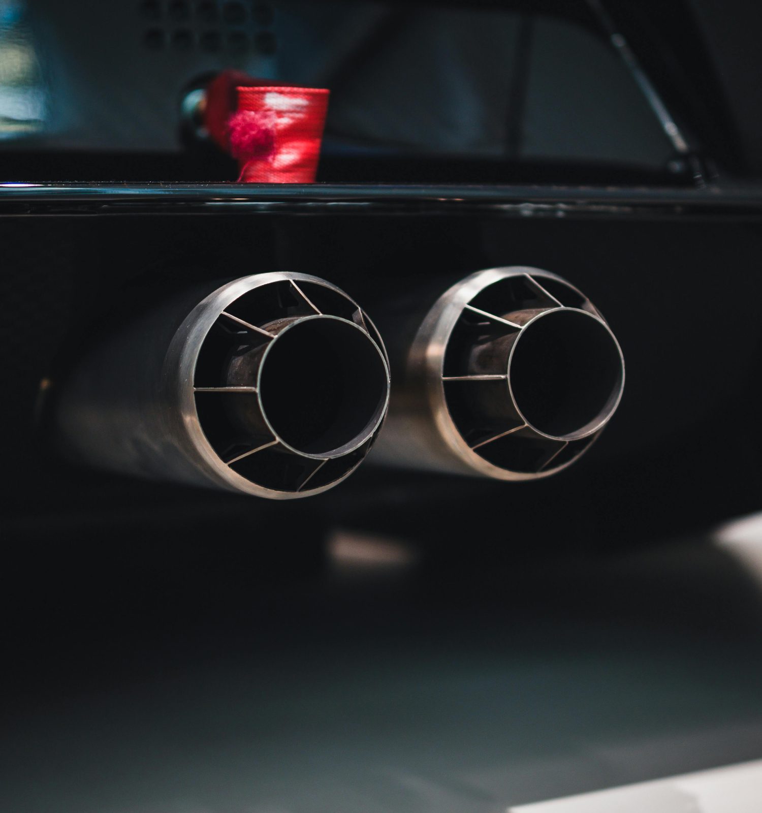 close up of a vehicle exhaust - ADL Auto Repair & Driveshafts