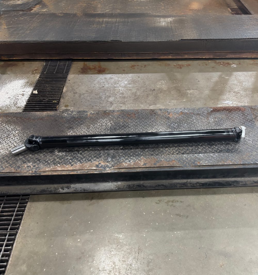 close up of a vehicle driveshaft - ADL Auto Repair & Driveshafts