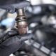 mechanic with a vehicle driveshaft - ADL Auto Repair & Driveshafts Driveshaft Repair in Hugo