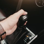 ADLAutoRepair&Driveshafts-transmission-fluid-010820261 person shifting their vehicle - ADL Auto Repair & Driveshafts transmission fluid