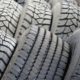 close up of tires stacked beside each other - ADL Auto Repair & Driveshafts vehicle alignment