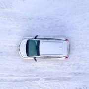 ADLAutoRepair&Driveshafts-winter-driveline-maintenance-030520261 overhead image of a vehicle driving on a snow covered road - ADL Auto Repair & Driveshafts Driveshaft Repair in Hugo
