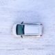overhead image of a vehicle driving on a snow covered road - ADL Auto Repair & Driveshafts Driveshaft Repair in Hugo