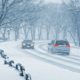vehicles driving during a snow blizzard ADL Auto Repair & Driveshafts 4WD System Maintenance